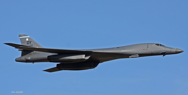 B-1B Lancer from Dyess Air Force Base with wings swept back for high-speed flight.